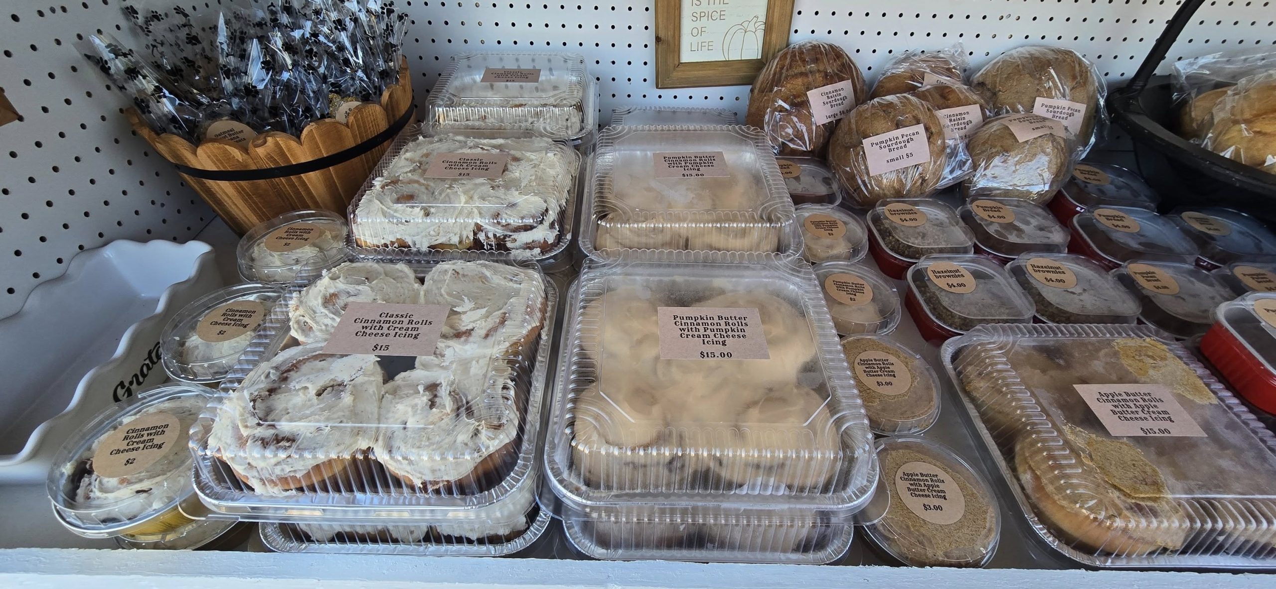 Tray of cinnamon rolls with apple butter and pumpkin butter